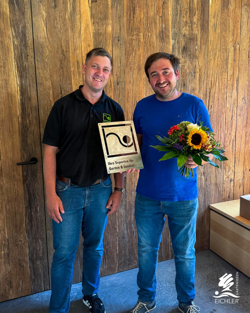 Galabau Verbandschef Axel Keul gratuliert Alexander Eichler